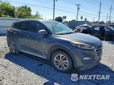 Czwarte zdjęcie samochodu z boku: 2017 HYUNDAI TUCSON SE VIN:KM8J3CA4XHU497654 - miniatura