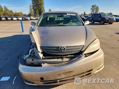 Piąte zdjęcie samochodu w środku: 2002 TOYOTA CAMRY LE VIN:JTDBE32K220093262 - miniatura