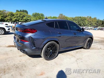 Trzecie zdjęcie samochodu z tyłu: 2022 BMW X6 M50I VIN:5UXCY8C09N9L68372 - miniatura