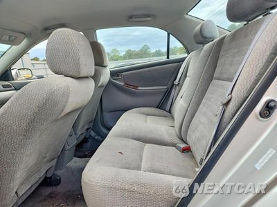 Zdjęcie 10 z 12 samochodu: 2004 TOYOTA COROLLA LE VIN:1NXBR32E64Z252953 - miniatura