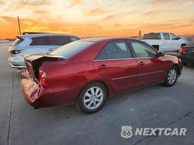 Trzecie zdjęcie samochodu z tyłu: 2003 TOYOTA CAMRY XLE V6 VIN:JTDBF30K730096059 - miniatura