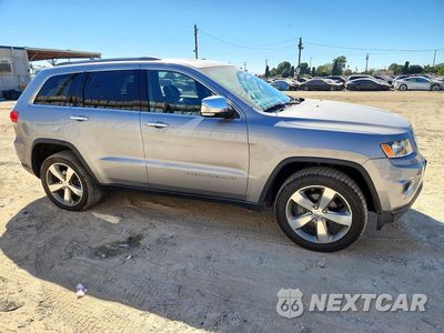 Czwarte zdjęcie samochodu z boku: 2014 JEEP GRAND CHEROKEE LIMITED VIN:1C4RJEBG7EC240065 - miniatura