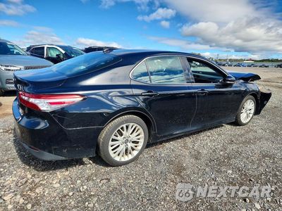 Trzecie zdjęcie samochodu z tyłu: 2018 TOYOTA CAMRY HYBRID XLE VIN:4T1B21HK4JU504670 - miniatura