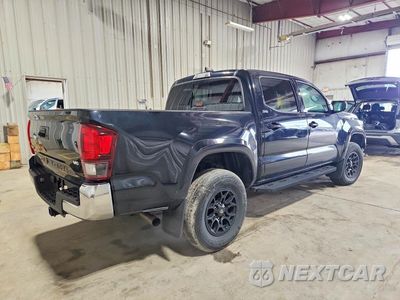 Trzecie zdjęcie samochodu z tyłu: 2022 TOYOTA TACOMA SR5 V6 VIN:3TMCZ5ANXNM484984 - miniatura