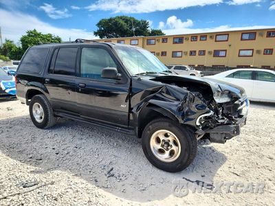 Czwarte zdjęcie samochodu z boku: 1999 FORD EXPLORER VIN:1FMDU32E3XUB17943 - miniatura