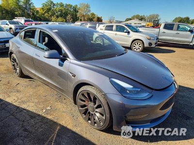 Czwarte zdjęcie samochodu z boku: 2023 TESLA MODEL 3 VIN:5YJ3E1EC9PF685828 - miniatura
