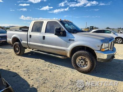 Czwarte zdjęcie samochodu z boku: 1999 FORD F250 SUPER DUTY VIN:1FTNW21F2XEA38233 - miniatura