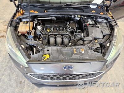 Zdjęcie 11 z 12 samochodu: 2016 FORD FOCUS TITANIUM VIN:1FADP3N21GL242822 - miniatura