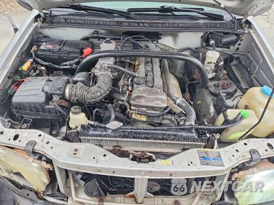 Zdjęcie 11 z 13 samochodu: 2003 CHEVROLET TRACKER VIN:2CNBE13CX36953148 - miniatura