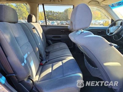 Zdjęcie 11 z 14 samochodu: 2006 HONDA PILOT EX VIN:2HKYF18426H526186 - miniatura