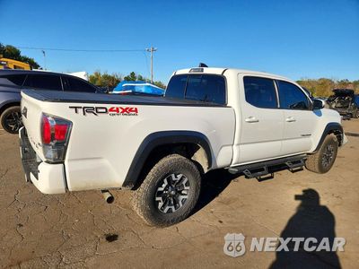 Trzecie zdjęcie samochodu z tyłu: 2020 TOYOTA TACOMA TRD OFF-ROAD VIN:3TMDZ5BNXLM095522 - miniatura