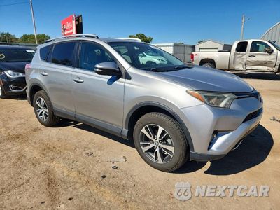 Czwarte zdjęcie samochodu z boku: 2016 TOYOTA RAV4 XLE VIN:2T3WFREV9GW236508 - miniatura