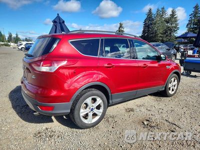 Trzecie zdjęcie samochodu z tyłu: 2016 FORD ESCAPE SE VIN:1FMCU9GX1GUC12512 - miniatura