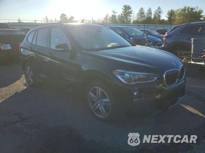 Czwarte zdjęcie samochodu z boku: 2017 BMW X1 SDRIVE28I VIN:WBXHU7C31HP924653 - miniatura