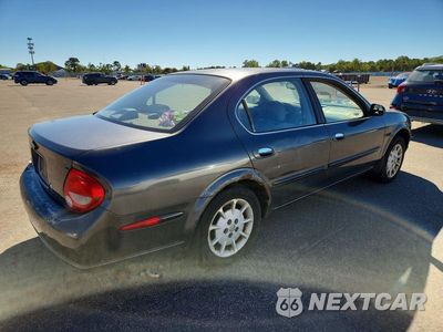 Trzecie zdjęcie samochodu z tyłu: 2001 NISSAN MAXIMA GXE VIN:JN1CA31D41T604957 - miniatura