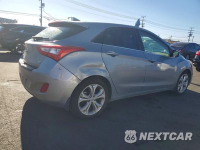 Trzecie zdjęcie samochodu z tyłu: 2014 HYUNDAI ELANTRA GT BASE VIN:KMHD35LH2EU194422 - miniatura