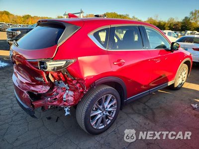 Trzecie zdjęcie samochodu z tyłu: 2021 MAZDA CX-5 GRAND TOURING VIN:JM3KFBDM9M1335765 - miniatura