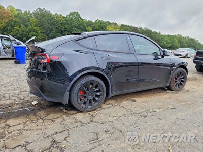 Trzecie zdjęcie samochodu z tyłu: 2021 TESLA MODEL Y VIN:5YJYGDEE6MF186841 - miniatura