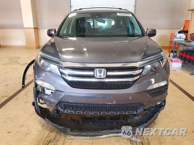 Piąte zdjęcie samochodu w środku: 2017 HONDA PILOT ELITE VIN:5FNYF6H00HB104705 - miniatura