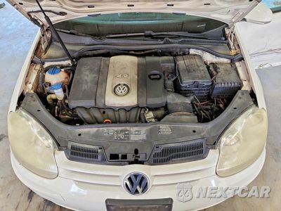 Zdjęcie 11 z 12 samochodu: 2007 VOLKSWAGEN RABBIT VIN:WVWCR71K37W084978 - miniatura