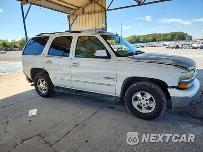 Czwarte zdjęcie samochodu z boku: 2003 CHEVROLET TAHOE C1500 VIN:1GNEC13Z43J275745 - miniatura