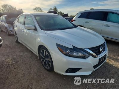 Czwarte zdjęcie samochodu z boku: 2016 NISSAN ALTIMA 2.5 SR VIN:1N4AL3AP4GC271117 - miniatura