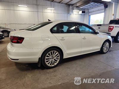 Trzecie zdjęcie samochodu z tyłu: 2016 VOLKSWAGEN JETTA SEL VIN:3VWL17AJ8GM226768 - miniatura
