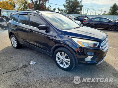 Czwarte zdjęcie samochodu z boku: 2018 FORD ESCAPE SE VIN:1FMCU9GD1JUB29370 - miniatura
