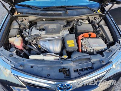 Zdjęcie 11 z 12 samochodu: 2012 TOYOTA CAMRY HYBRID XLE VIN:4T1BD1FK7CU023585 - miniatura