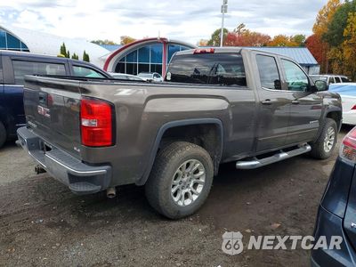 Trzecie zdjęcie samochodu z tyłu: 2014 GMC SIERRA K1500 SLE VIN:1GTV2UEC9EZ396359 - miniatura