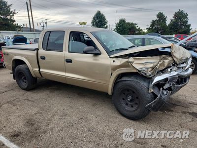 Czwarte zdjęcie samochodu z boku: 2004 DODGE DAKOTA QUAD SLT VIN:1D7HG48N44S732458 - miniatura