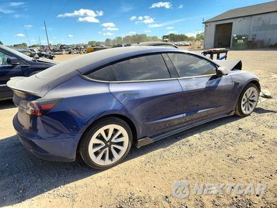 Trzecie zdjęcie samochodu z tyłu: 2021 TESLA MODEL 3 VIN:5YJ3E1EB0MF980741 - miniatura