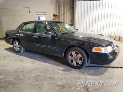 Czwarte zdjęcie samochodu z boku: 2011 FORD CROWN VICTORIA LX VIN:2FABP7EV7BX148691 - miniatura
