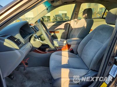 Zdjęcie 7 z 12 samochodu: 2003 TOYOTA CAMRY XLE VIN:4T1BE30KX3U685078 - miniatura