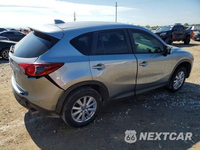 Trzecie zdjęcie samochodu z tyłu: 2014 MAZDA CX-5 TOURING VIN:JM3KE2CY4E0407227 - miniatura