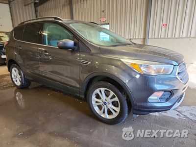 Czwarte zdjęcie samochodu z boku: 2018 FORD ESCAPE SE VIN:1FMCU9GD1JUB81114 - miniatura