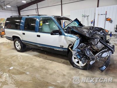 Czwarte zdjęcie samochodu z boku: 1994 GMC SUBURBAN C1500 VIN:1GKEC16K9RJ754098 - miniatura