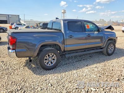 Trzecie zdjęcie samochodu z tyłu: 2019 TOYOTA TACOMA SR5 V6 VIN:3TMAZ5CN4KM097802 - miniatura