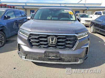 Piąte zdjęcie samochodu w środku: 2025 HONDA PILOT EXL VIN:5FNYG1H48SB042481 - miniatura