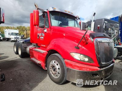 Czwarte zdjęcie samochodu z boku: 2009 INTERNATIONAL PROSTAR PREMIUM SEMI TRUCK VIN:2HSCUAPR49C116522 - miniatura