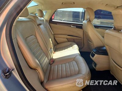 Zdjęcie 10 z 13 samochodu: 2013 FORD FUSION SE HYBRID VIN:3FA6P0LUXDR286052 - miniatura
