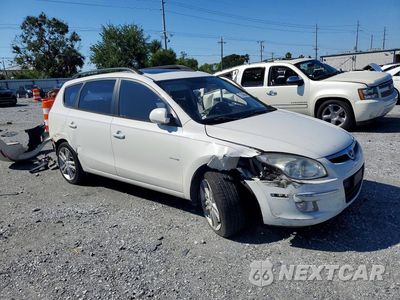 Czwarte zdjęcie samochodu z boku: 2010 HYUNDAI ELANTRA TOURING SE VIN:KMHDC8AE9AU061063 - miniatura