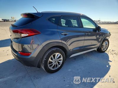 Trzecie zdjęcie samochodu z tyłu: 2017 HYUNDAI TUCSON SE VIN:KM8J33A42HU433124 - miniatura