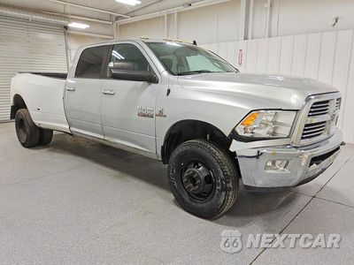 Czwarte zdjęcie samochodu z boku: 2015 RAM 3500 SLT VIN:3C63RRHL6FG579688 - miniatura