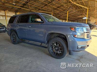 Czwarte zdjęcie samochodu z boku: 2015 CHEVROLET TAHOE K1500 LTZ VIN:1GNSKCKC2FR692320 - miniatura
