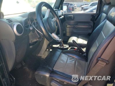 Zdjęcie 7 z 12 samochodu: 2009 JEEP WRANGLER UNLIMITED SAHARA VIN:1J4GA591X9L732081 - miniatura