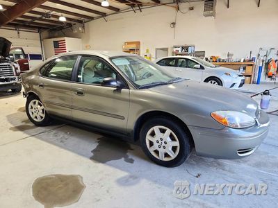 Czwarte zdjęcie samochodu z boku: 2004 FORD TAURUS SE VIN:1FAFP53294A191052 - miniatura