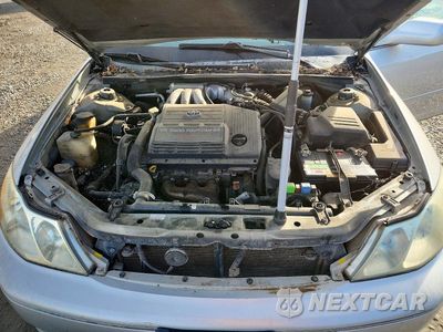 Zdjęcie 11 z 12 samochodu: 2004 TOYOTA AVALON XLS VIN:4T1BF28B24U378047 - miniatura