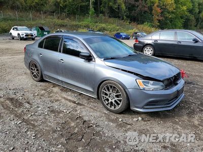 Czwarte zdjęcie samochodu z boku: 2015 VOLKSWAGEN JETTA BASE VIN:3VW1K7AJ0FM274512 - miniatura