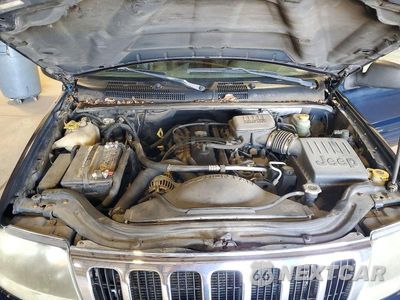 Zdjęcie 12 z 13 samochodu: 2002 JEEP GRAND CHEROKEE LAREDO VIN:1J8GW48S52C270202 - miniatura